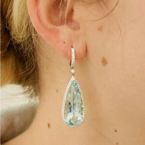 40 ct aquamarine earrings with 2.41 ct worth of diamonds (86 total) in 14kt gold